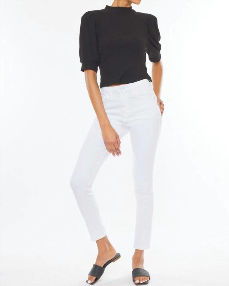 Front of a model wearing a size 0/23 Annabelle High Rise Super Skinny Jeans in White in White by KanCan. | dia_product_style_image_id:325874